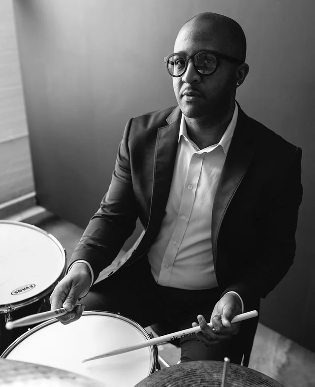 Quincy Davis playing drums